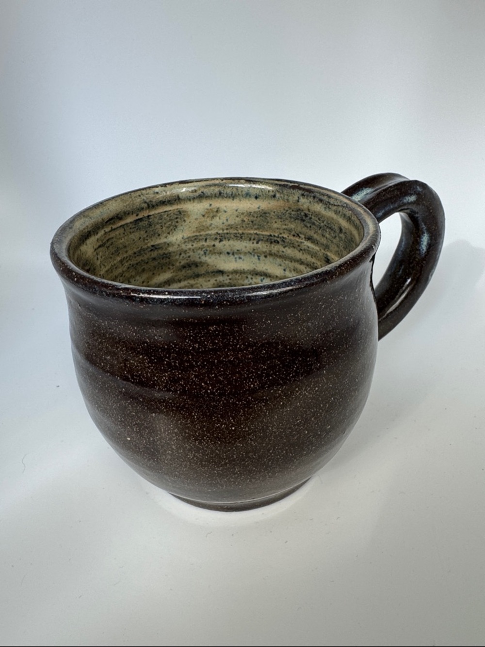 Handmade Speckled Brown Ceramic Mug with blue specks inside